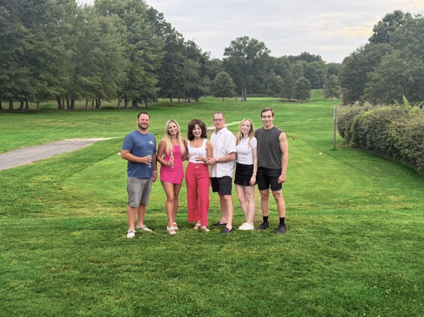 Owners of golf course on green